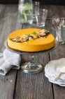 Chocolate and pumpkin cheesecake with toasted almonds — Stock Photo