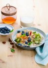 Porridge with fresh fruit — Stock Photo