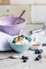 Quark with blueberries and flax seeds — Stock Photo