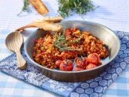 Ratatouille with oven-baked tomatoes and thyme — Stock Photo