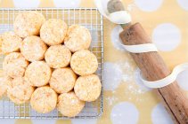 Pumpkin scones on a cooling rack — Stock Photo