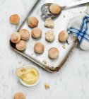 Mini bread rolls with butter — Stock Photo