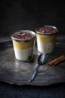 Vegan rice pudding with a Christmassy apple compote and a chocolate crust — Stock Photo