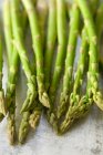 Green asparagus on white background — Stock Photo