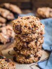 Vegan chocolate chip oatmeal cookies arranged in a pile — Stock Photo