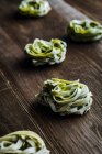 Green spinach tagliatelle close-up view — Stock Photo