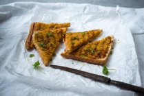 Toast topped with vegan chickpea curry spread — Stock Photo