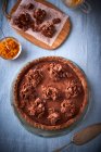 A chocolate and pumpkin tart topped with cornflakes — Stock Photo