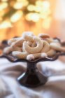 Vanilla crescent biscuits on a cake stand — Stock Photo
