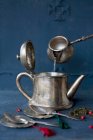 Tea making in silver jug — Stock Photo