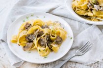 Pappardelle Pasta with Mushrooms and fresh herbs — Stock Photo