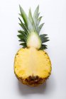 Pineapple, halved close-up view — Stock Photo