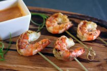 Grilled shrimp with satay dipping sauce — Stock Photo