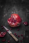 A sliced pomegranate close-up view — Stock Photo