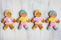 Hansel & Gretel gingerbread biscuits decorated with icing — Stock Photo