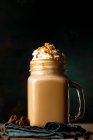 A caramel latte with cream — Stock Photo