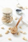 Almond Butter on a Wooden Spoon — Stock Photo