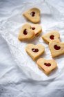 Vegan shortbread jam biscuits filled with strawberry fruit spread — Stock Photo