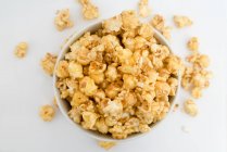 Popcorn in a white bowl — Stock Photo