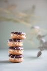 Sandwich cookies with chocolate icing — Stock Photo