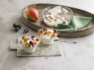 Yoghurt and quark with fruit — Stock Photo