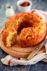 Spicy wreath cake with sausage, Provolone, olives and dried tomatoes — Stock Photo