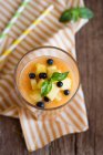 Apricot and peach smoothie with basil — Stock Photo