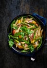 Vegetable penne with green asparagus and feta cheese — Stock Photo