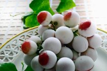 Frozen red grapes on a dish — Stock Photo