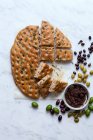 Olive focaccia and tapenade — Stock Photo