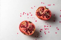 Pomegranate on white close-up view — Stock Photo