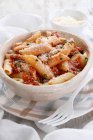 Penne pasta with tomato sauce and cheese — Stock Photo