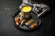 Healthy warm beverage for boosting immune system - turmeric golden milk — Stock Photo