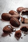 Chocolate madeleines with chocolate dipping sauce — Stock Photo