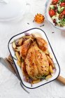 Roast chicken seasoned with cloves — Stock Photo