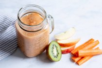 Carrot-banana drink with coconut — Stock Photo