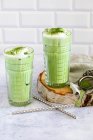 Vegan matcha iced tea with frothed oat milk — Stock Photo