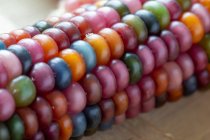Corn on the cob with colorful grains (close-up) — Fotografia de Stock