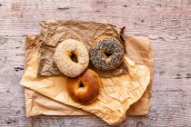Selection of bagels on brown paper bags — Stock Photo