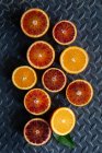 Orange and blood orange halves — Fotografia de Stock
