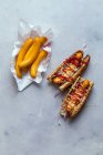 Hot dogs with frankfurter sausages — Stock Photo