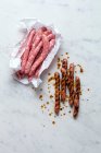 Fresh and grilled chipolata — Stock Photo