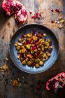 Brussels sprout salad with pomegranate seeds and walnuts — Stock Photo