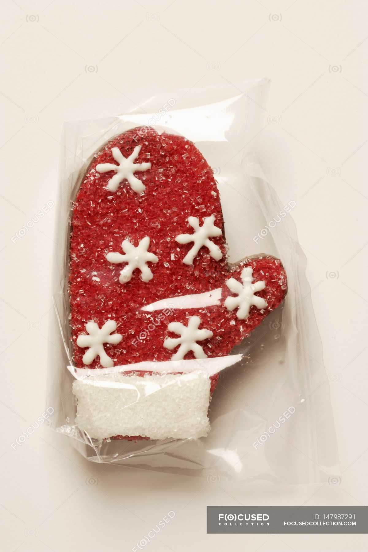 Closeup view of chocolate praline glove with red granulated sugar ...