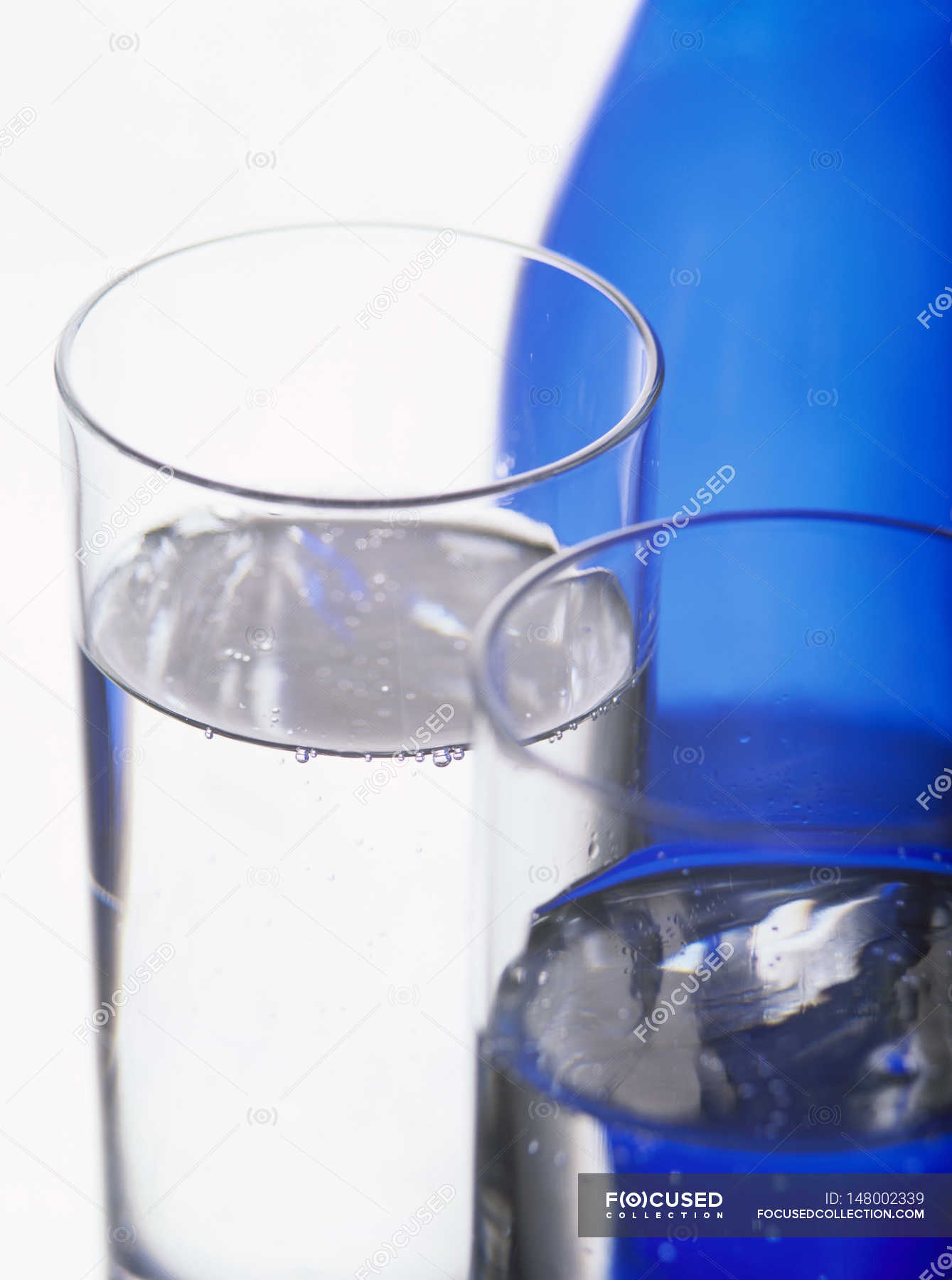 two-glasses-of-water-bottle-alcohol-free-stock-photo-148002339