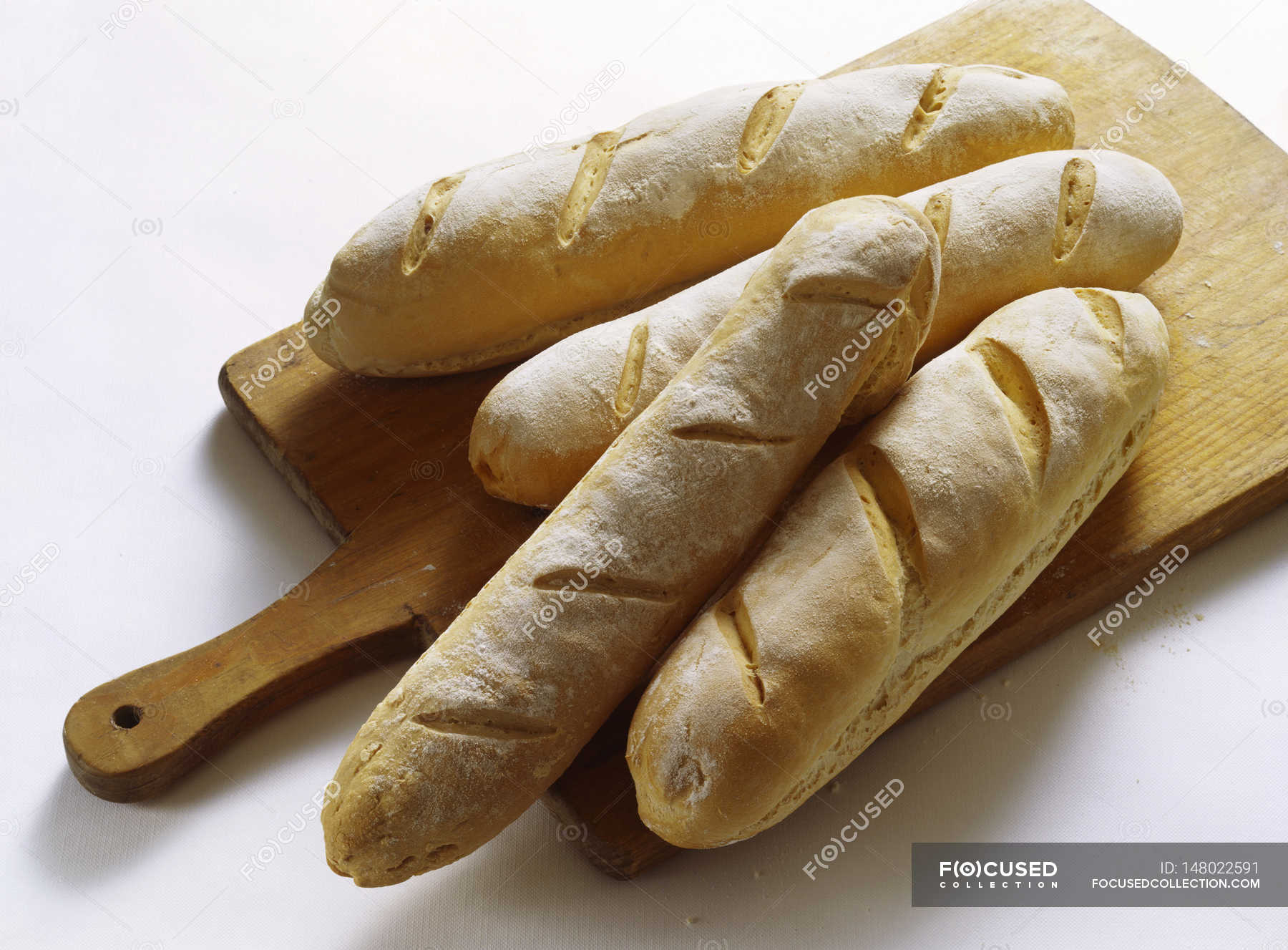 Freshly Baked Baguettes Wooden Meal Stock Photo