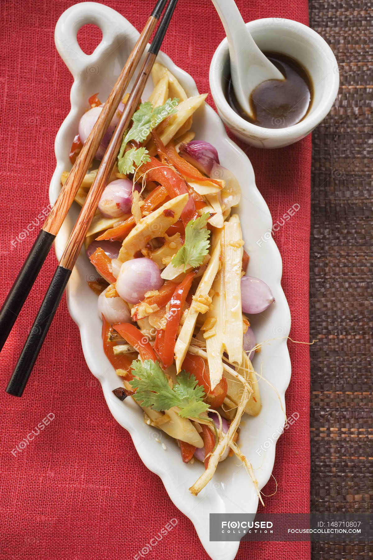 bamboo-shoots-with-peppers-edible-vertical-stock-photo-148710807