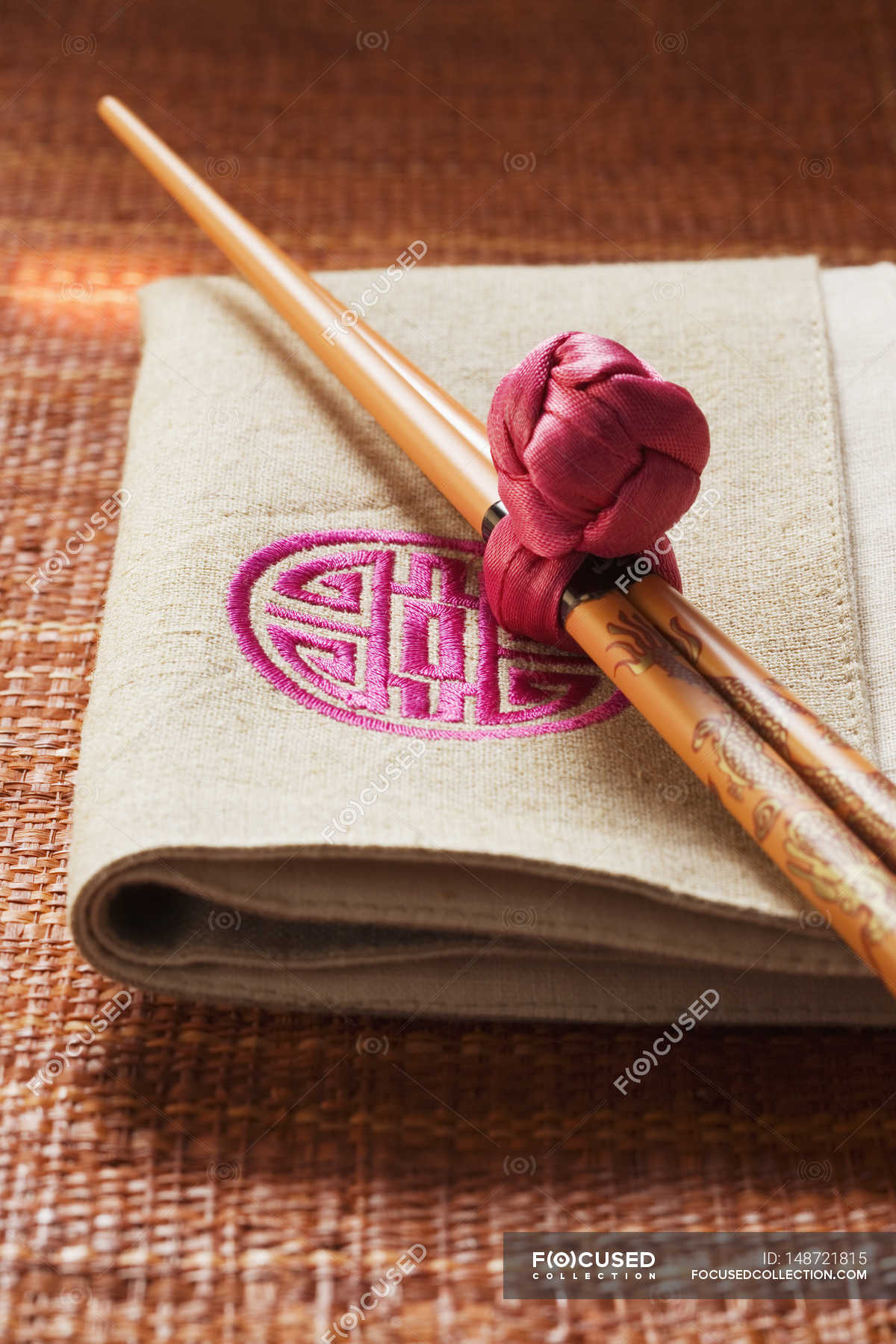 Chopsticks With Decoration Knot Close Up Background Stock