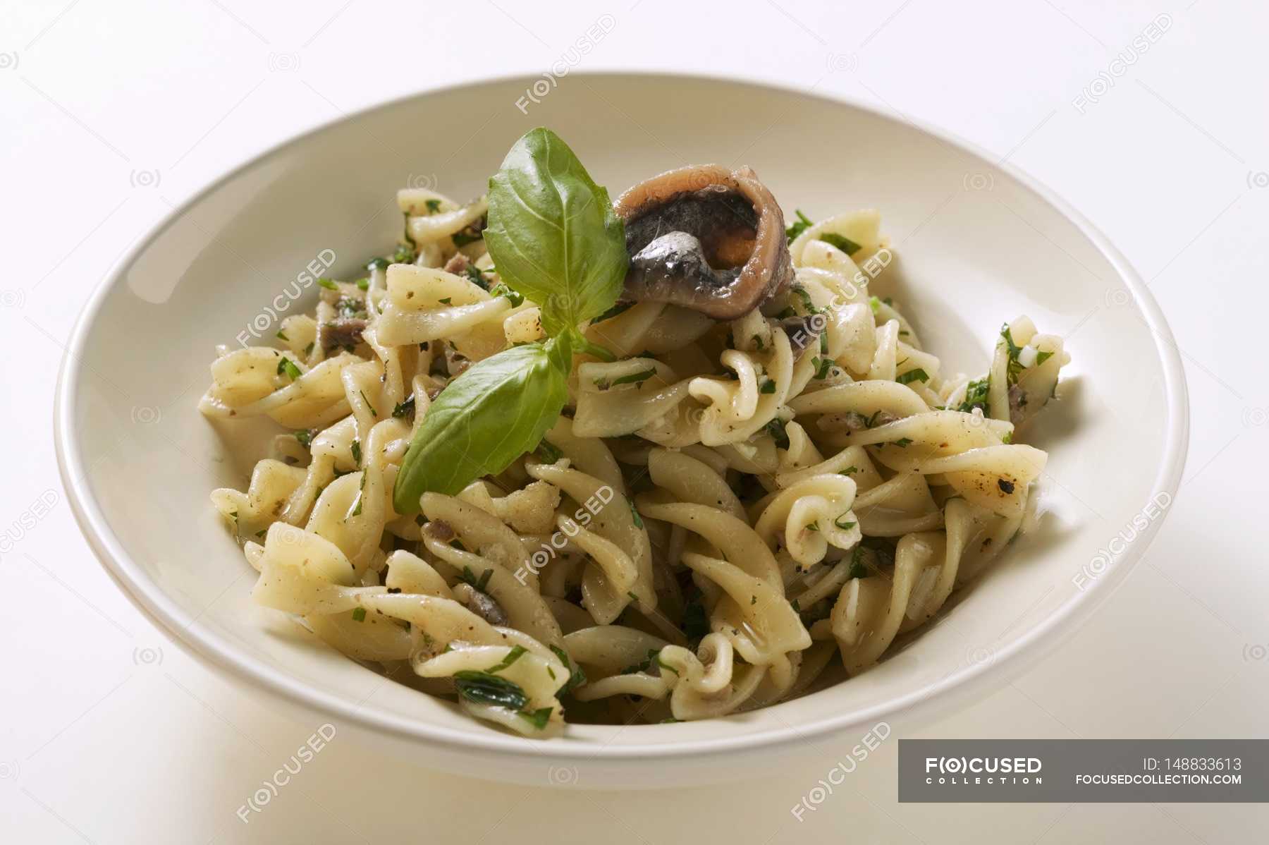 Fusilli pasta with sardines and basil — bowl, yummy Stock Photo