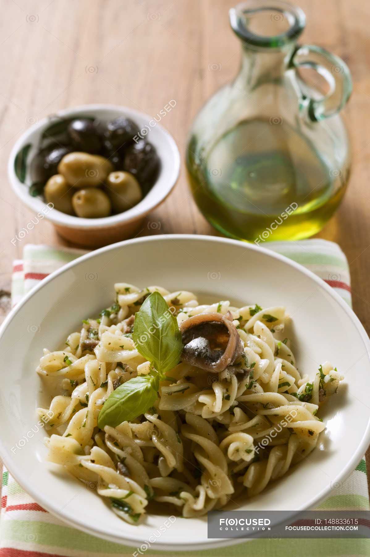 Fusilli pasta with sardines and basil — traditional, appetite Stock